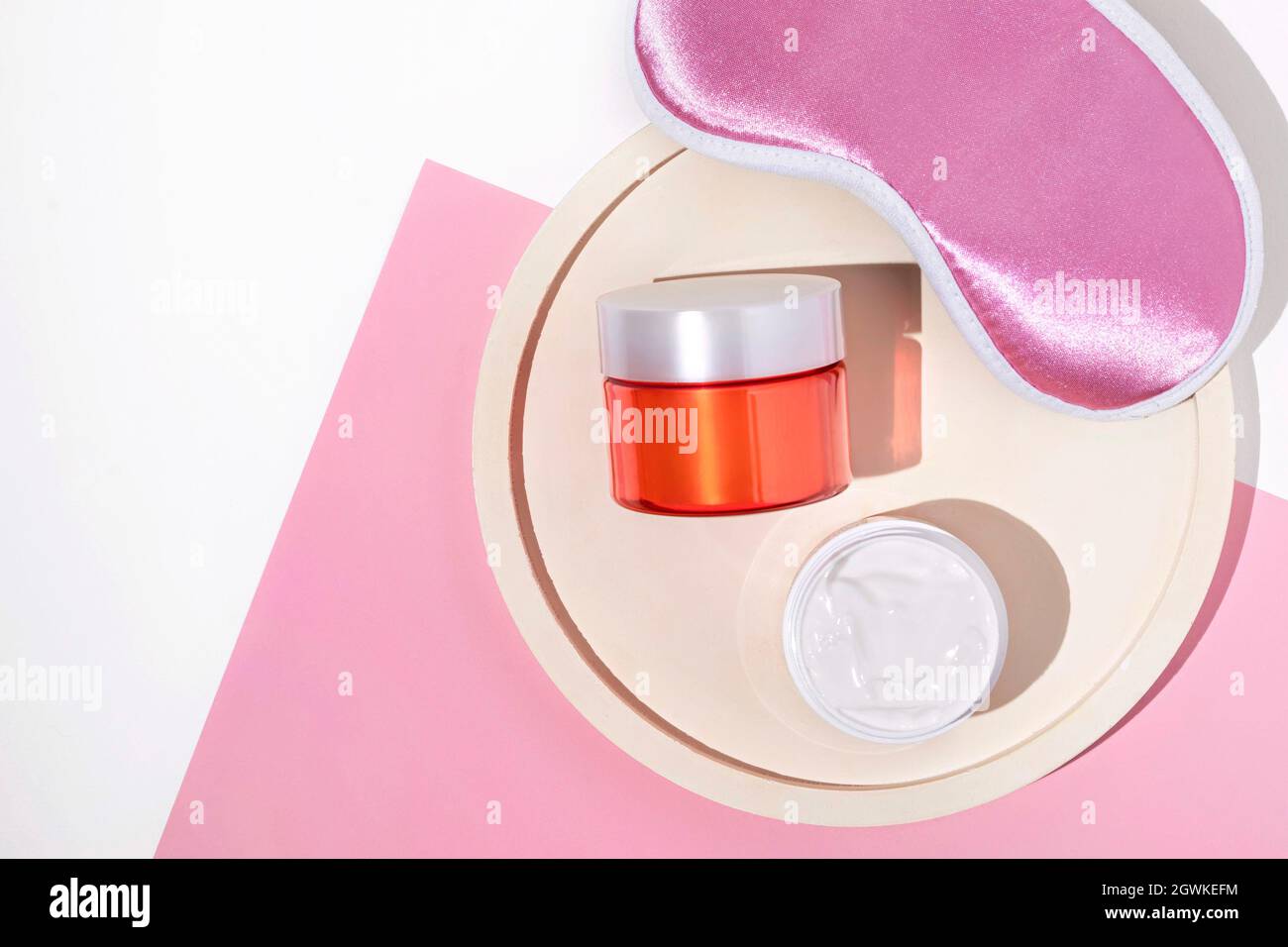 Night Face Care Routine Concept. Top View Sleeping Mask, Moisturizer Cream, Serum Lotion Stock