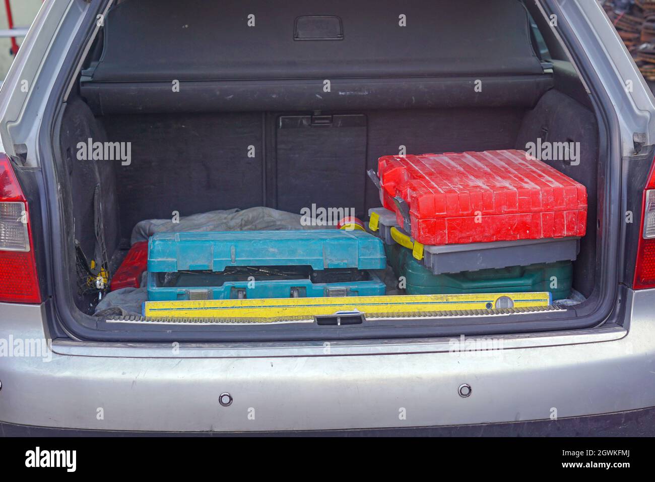Boxes of work tools in car trunk Stock Photo Alamy