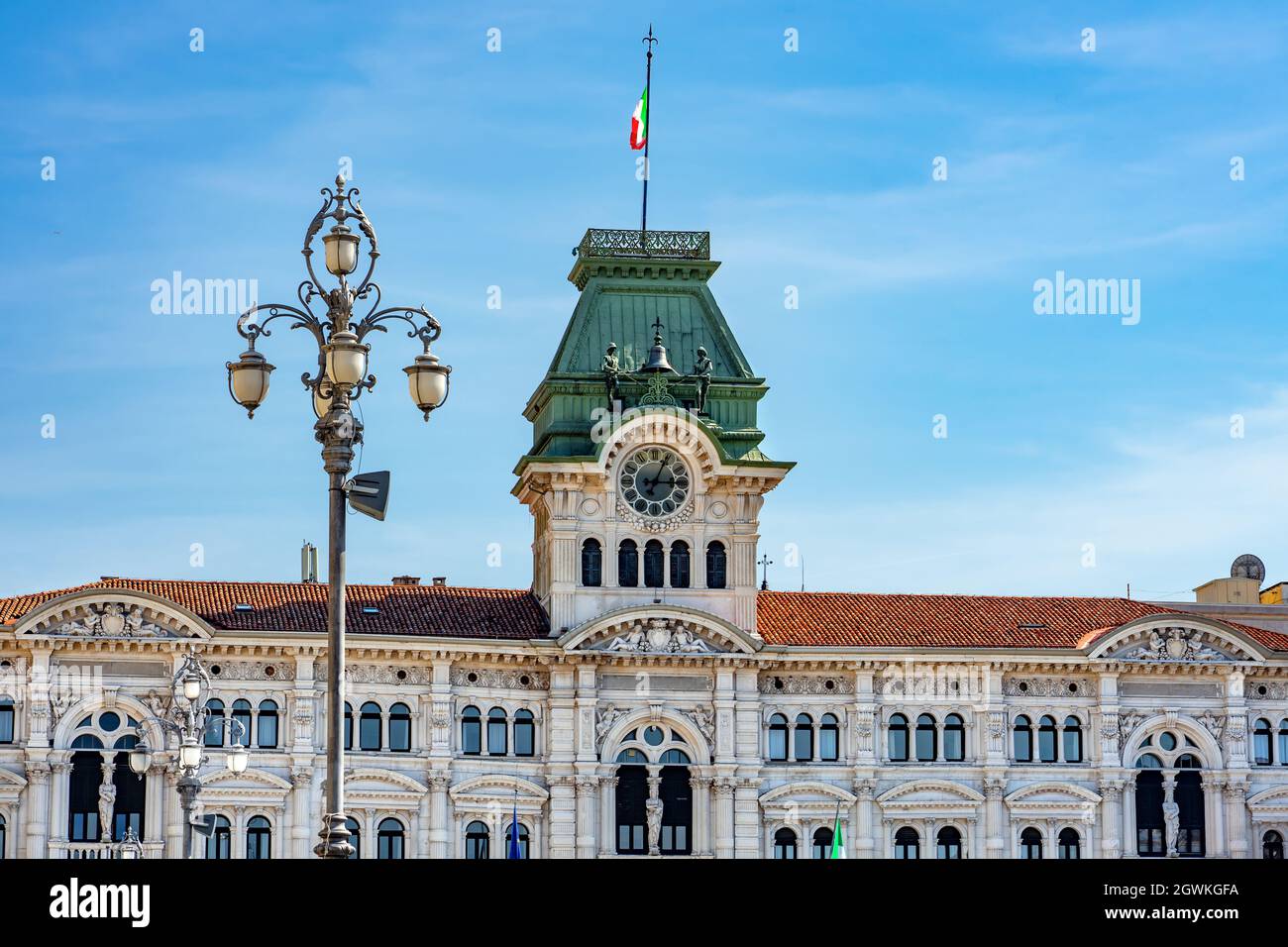 town hall on the piazza dell unita d'italia in Trieste next to the sea . Stock Photo