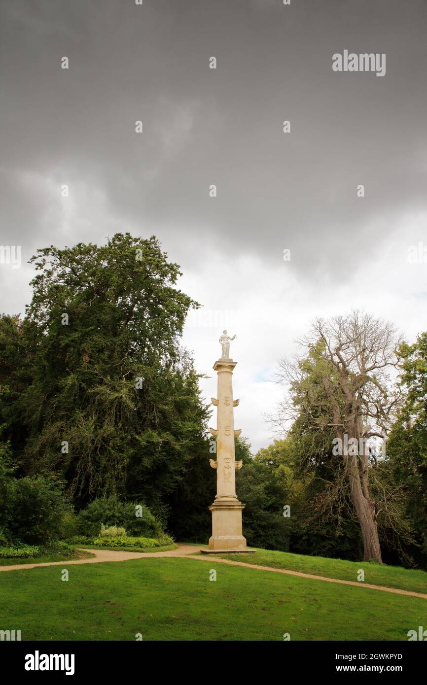 The Statue of Queen Caroline surrounded by trees in the grounds of stowe gardens Stock Photo Alamy