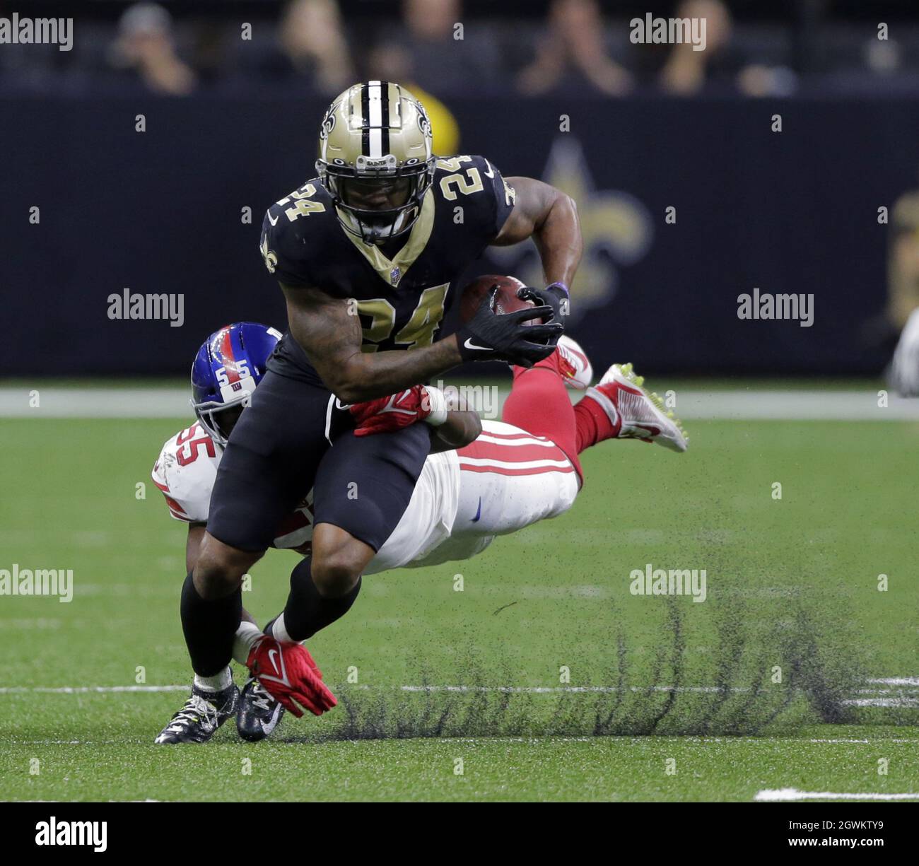 New Orleans, United States. 03rd Oct, 2021. New Orleans Saints running back  Dwayne Washington (24) carries the ball against the New York Giants at the  Caesars Superdome in New Orleans on Sunday,