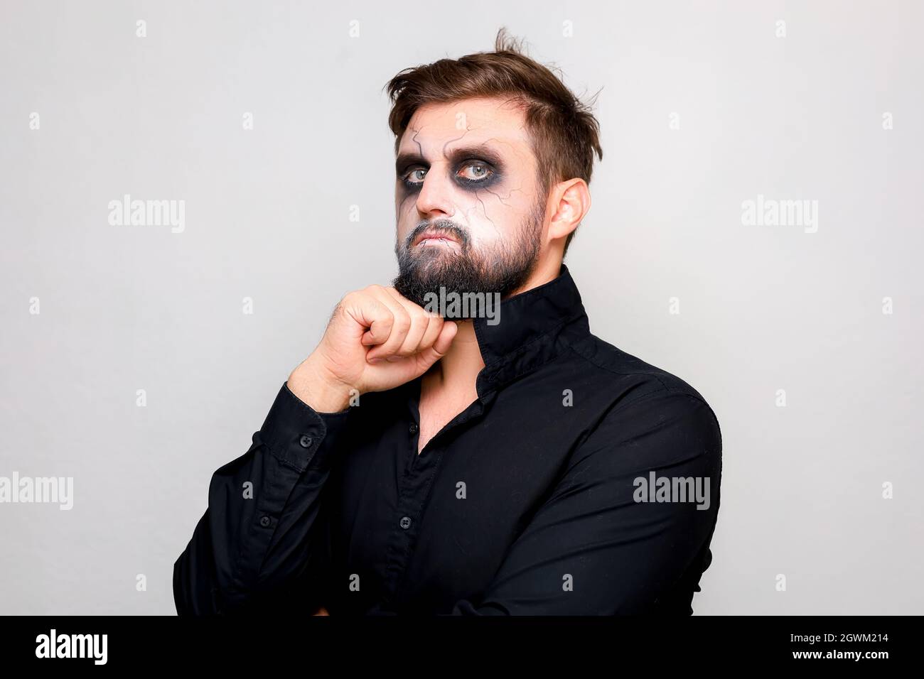 halloween makeup bearded man posing on camera Stock Photo - Alamy