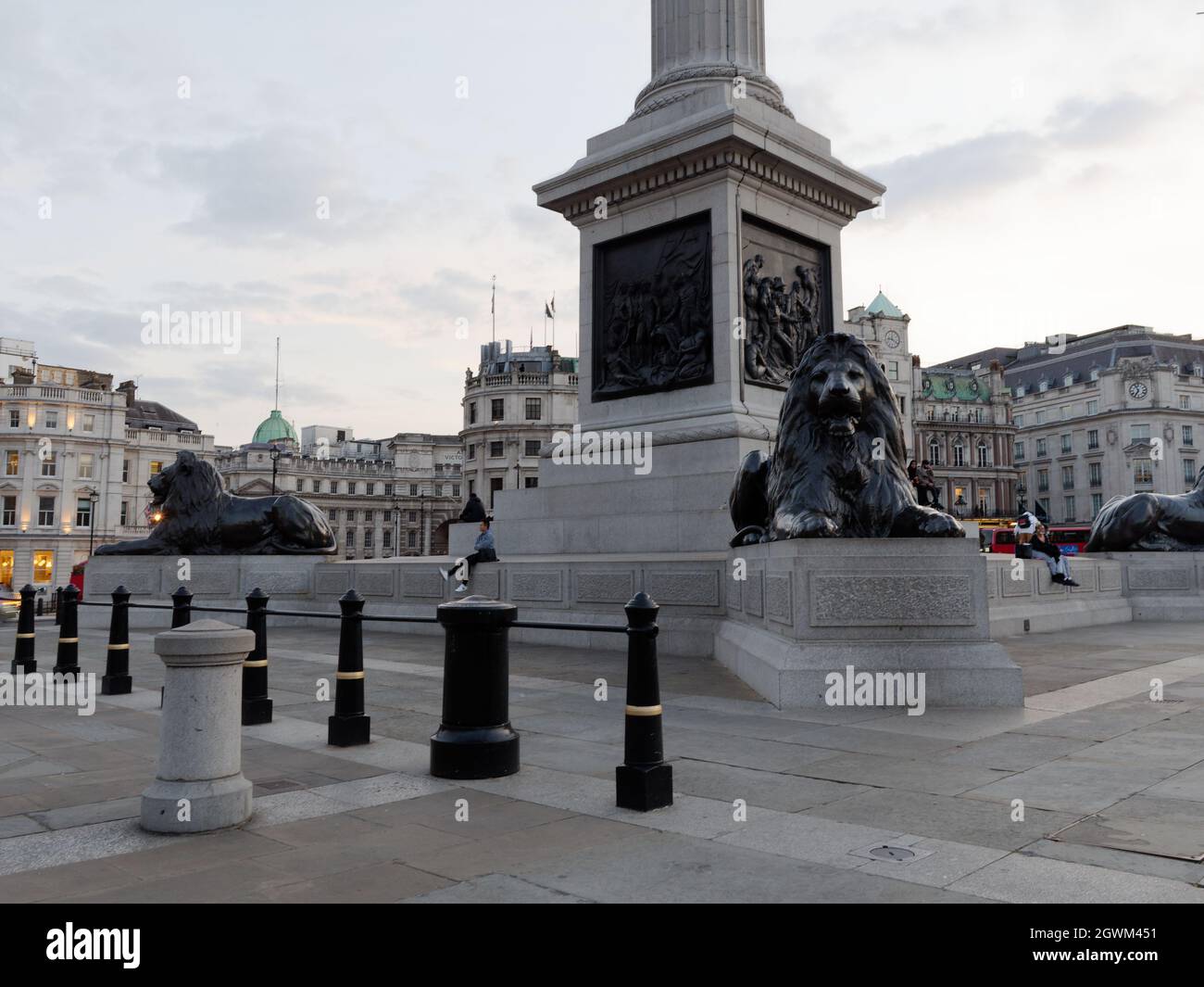 London, Greater London, England, September 21 2021: Lion statues at the foot of Nelsons Column in Trafalgar Square. Stock Photo