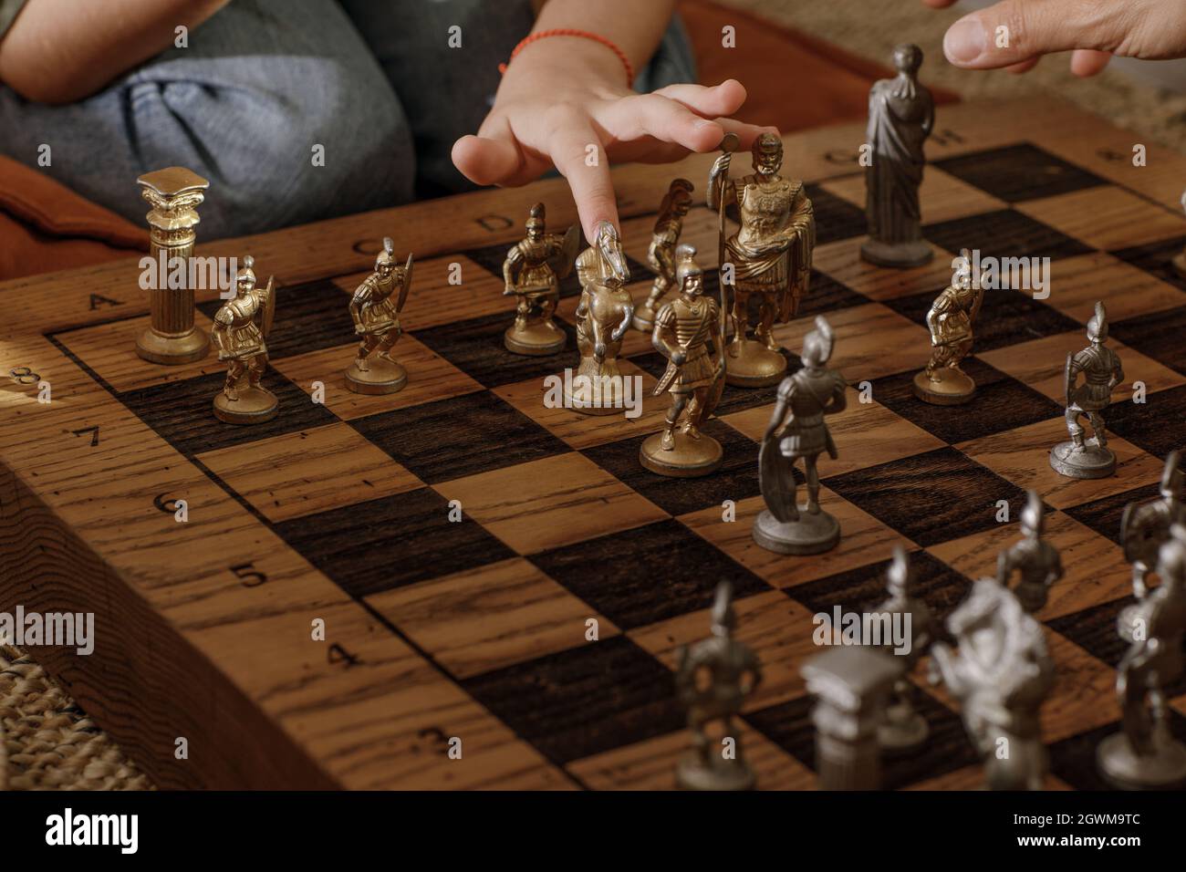 Ancient Metal Roman Chess Set With Silver And Gold Plated Pieces On Solid  Oak Wood Board. Concept Image For Business Strategy, Competition,  Relaxation Stock Photo - Alamy