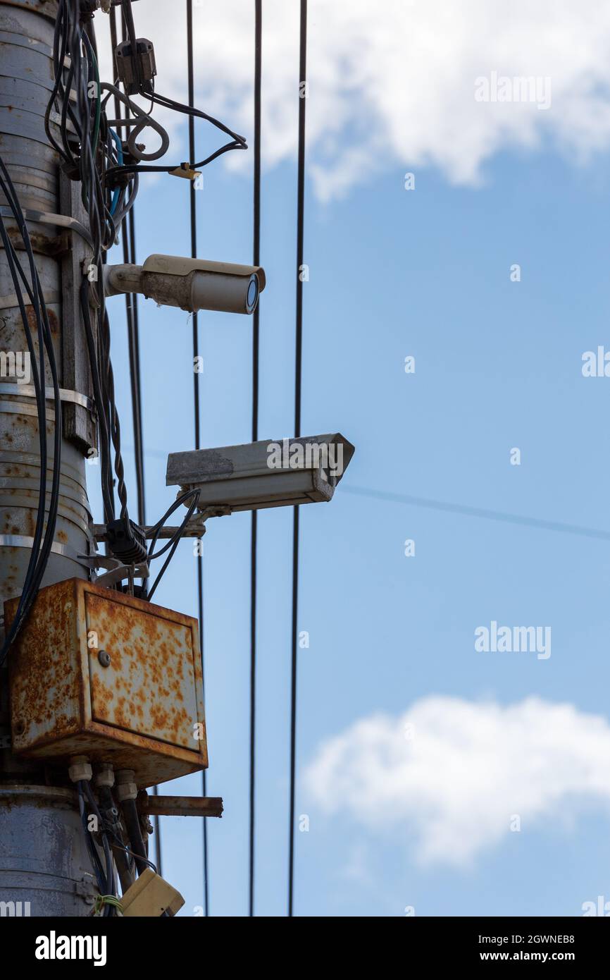 Surveillance camera on electric pole hires stock photography and