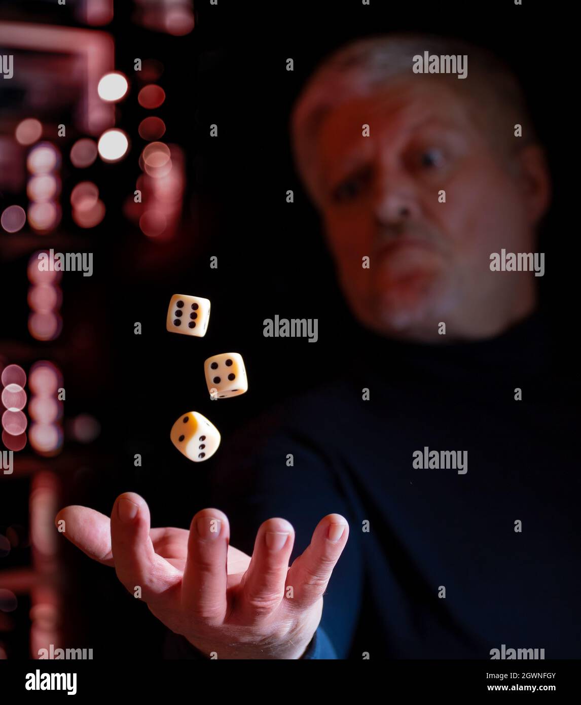 Hand throws dice hires stock photography and images Alamy