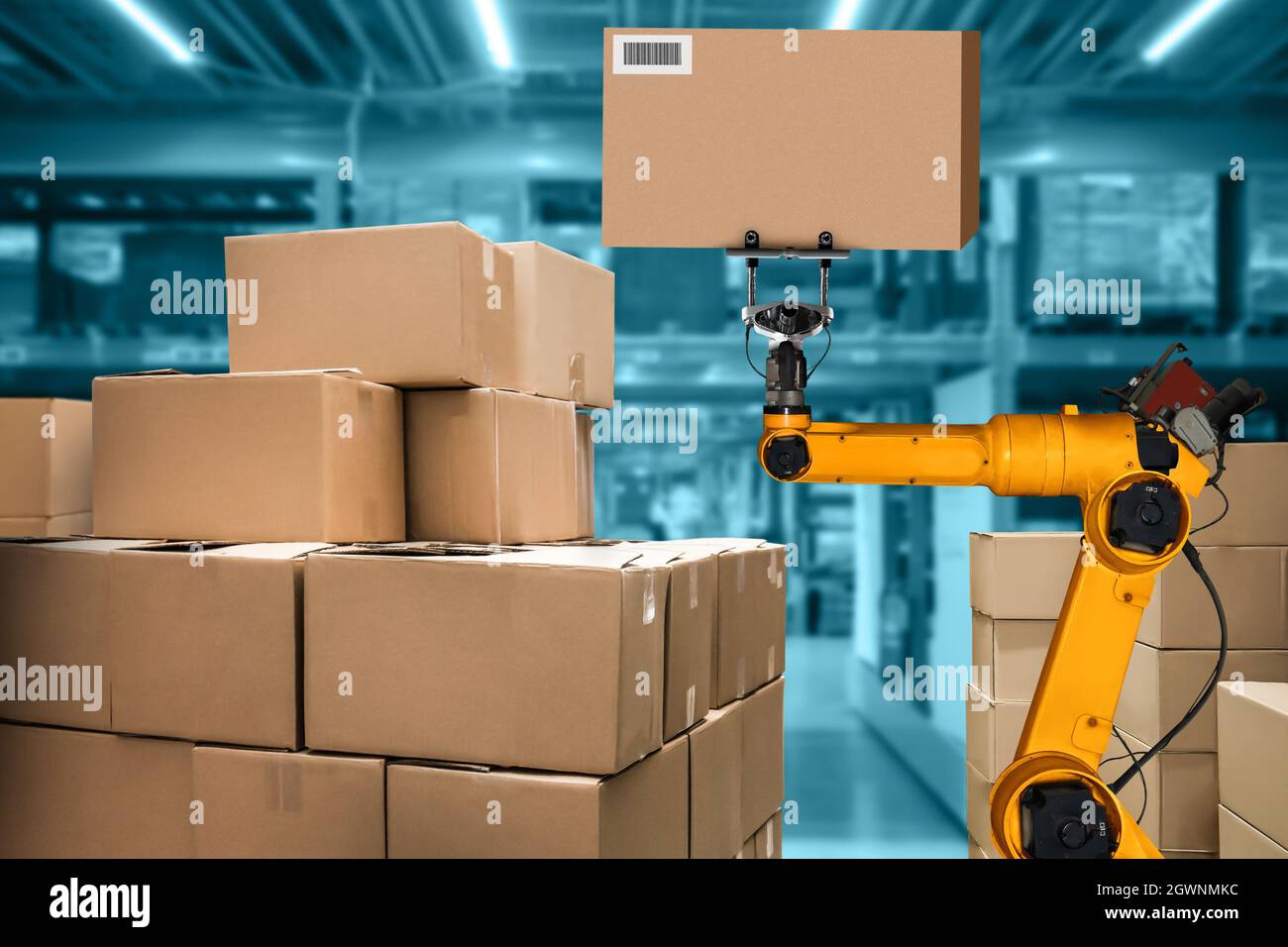 Smart robot arm system for innovative warehouse and factory digital technology . Automation manufacturing robot controlled by industry engineering Stock Photo