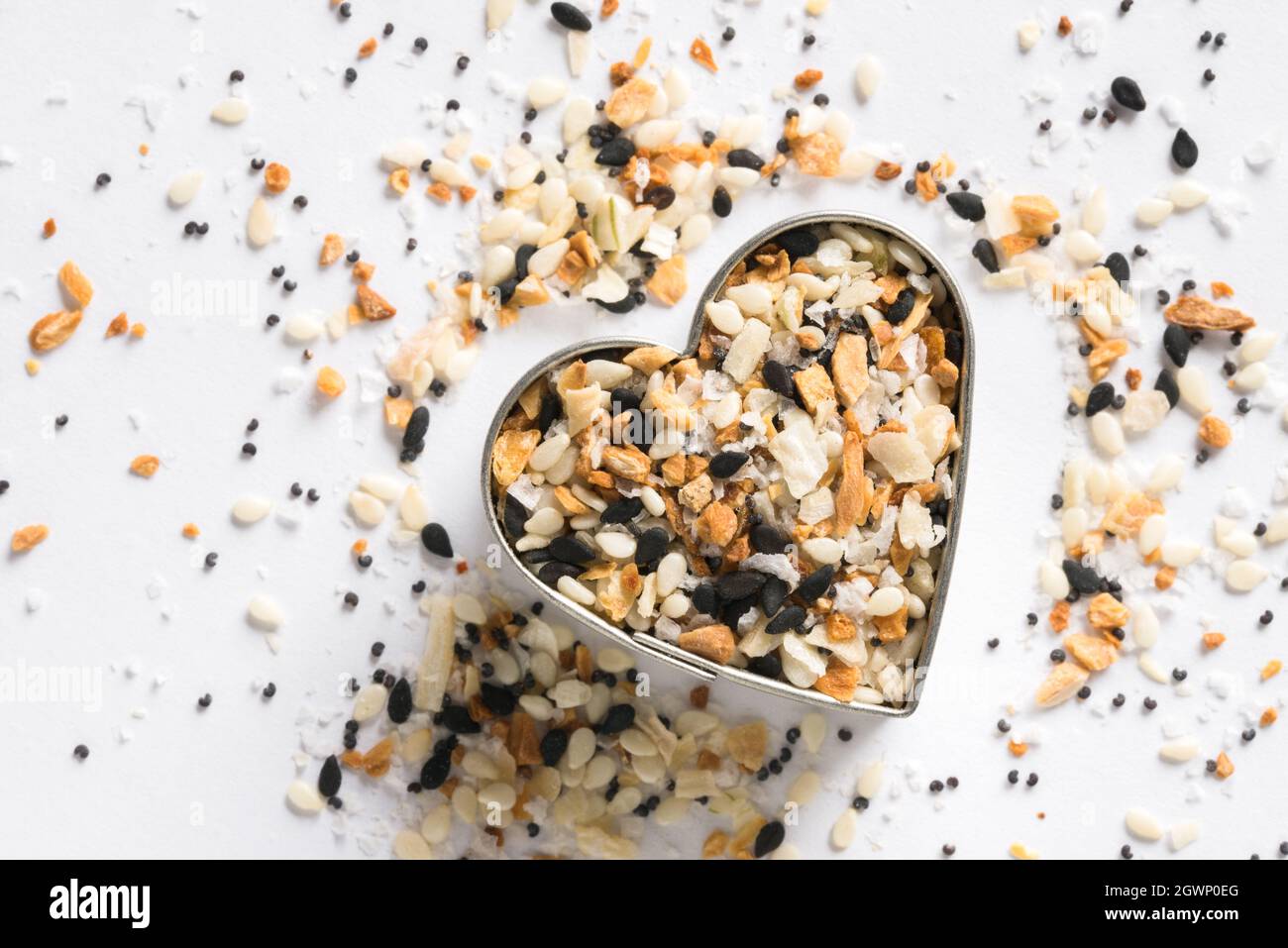 Everything Bagel Seasoning In A Heart Shape Stock Photo