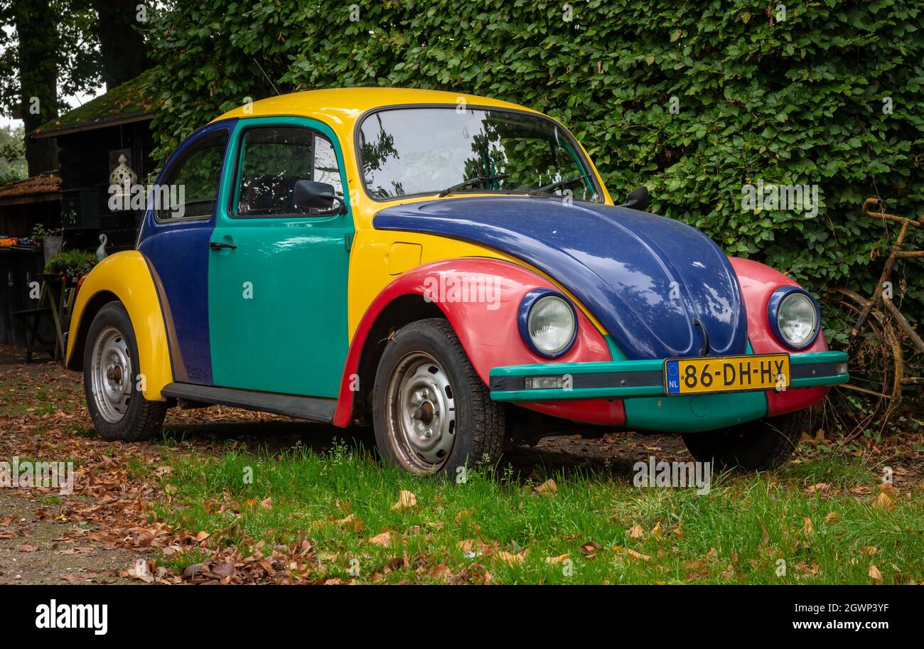 Galder, North Brabant, The Netherlands, 02.10.2021, multicolored Volkswagen 113 Beetle Harlequin from year 1996 Stock Photo