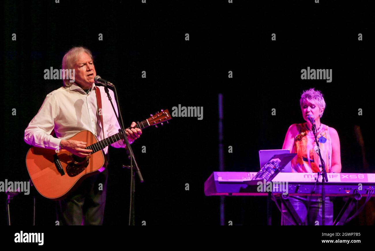 Justin Hayward (L) of the Moody Blues and Julie Ragins perform in concert at the Paramount on October 2, 2021 in Huntington, New York. Stock Photo