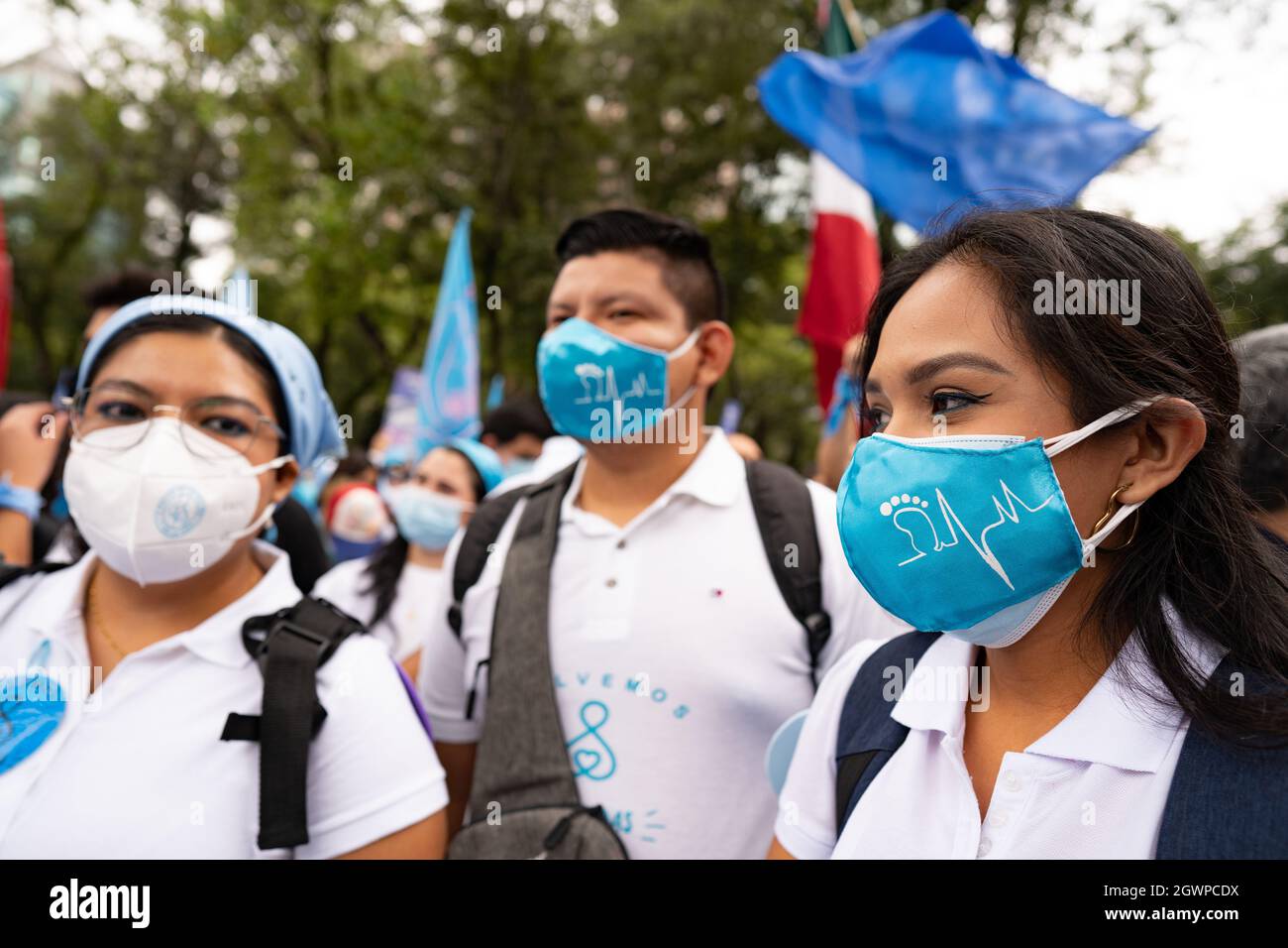 Mexico City, Mexico. 03rd Oct, 2021. A female demonstrator (R) seen wearing a pro-life maskThousands march in Mexico City at a pro-life and pro-women demonstration march. Demonstrators came in from all over the country, with different states or organizations written on their t-shirts. The march comes after the Mexican Supreme Court ruled that abortion is no longer a crime since September 2021. Credit: SOPA Images Limited/Alamy Live News Stock Photo