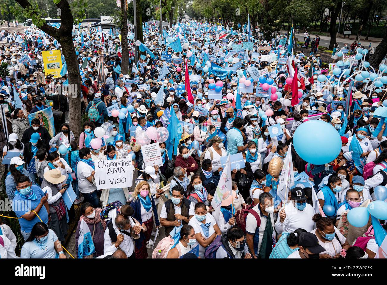 Mexico City, Mexico. 03rd Oct, 2021. Thousands of demonstrators gather outside the National Auditorium before marching to the Angel of Independence for the pro-life demonstration.Thousands march in Mexico City at a pro-life and pro-women demonstration march. Demonstrators came in from all over the country, with different states or organizations written on their t-shirts. The march comes after the Mexican Supreme Court ruled that abortion is no longer a crime since September 2021. Credit: SOPA Images Limited/Alamy Live News Stock Photo