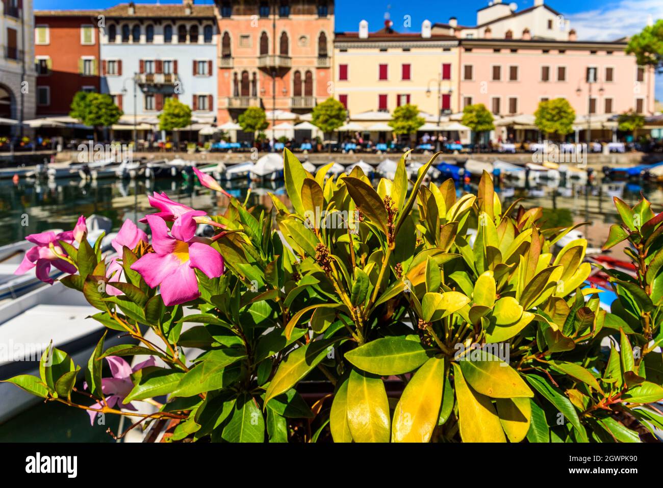 Desenzano del Garda, Italy - September 22, 2021: View of the small old port of Lake Garda a sunny day in Desenzano. Stock Photo