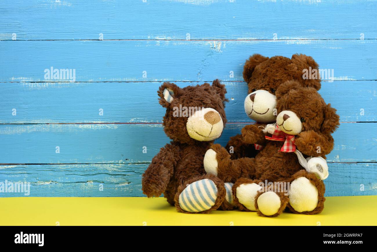 Teddy Bears Sitting On A Yellow Background, Family, Copy Space Stock ...