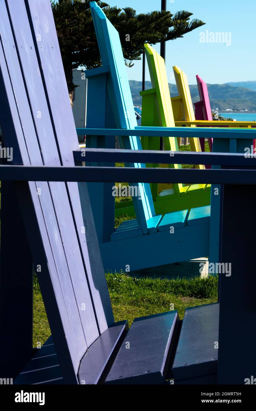 Large coloured chairs on waterfront at Napier, Hawkes Bay, North Island, New Zealand Stock Photo