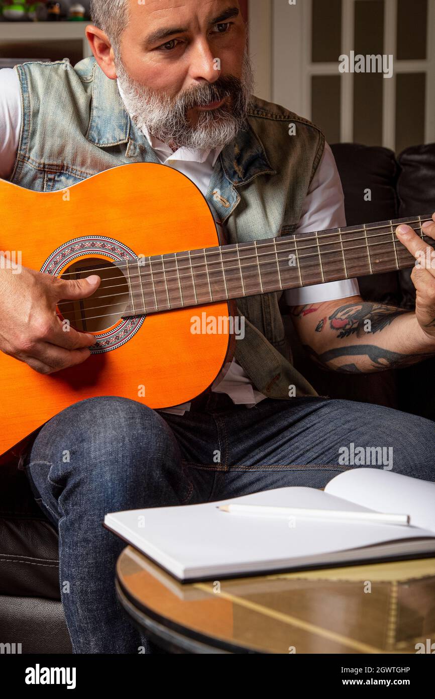 Modern Bearded Man Taking Guitar Lessons Online. Online Learning Concept  Stock Photo - Alamy