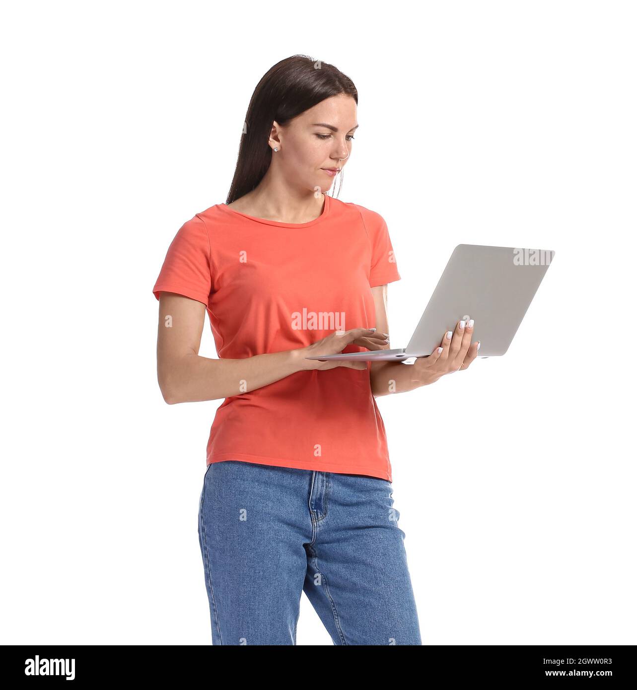 Pretty young woman with laptop on white background Stock Photo - Alamy