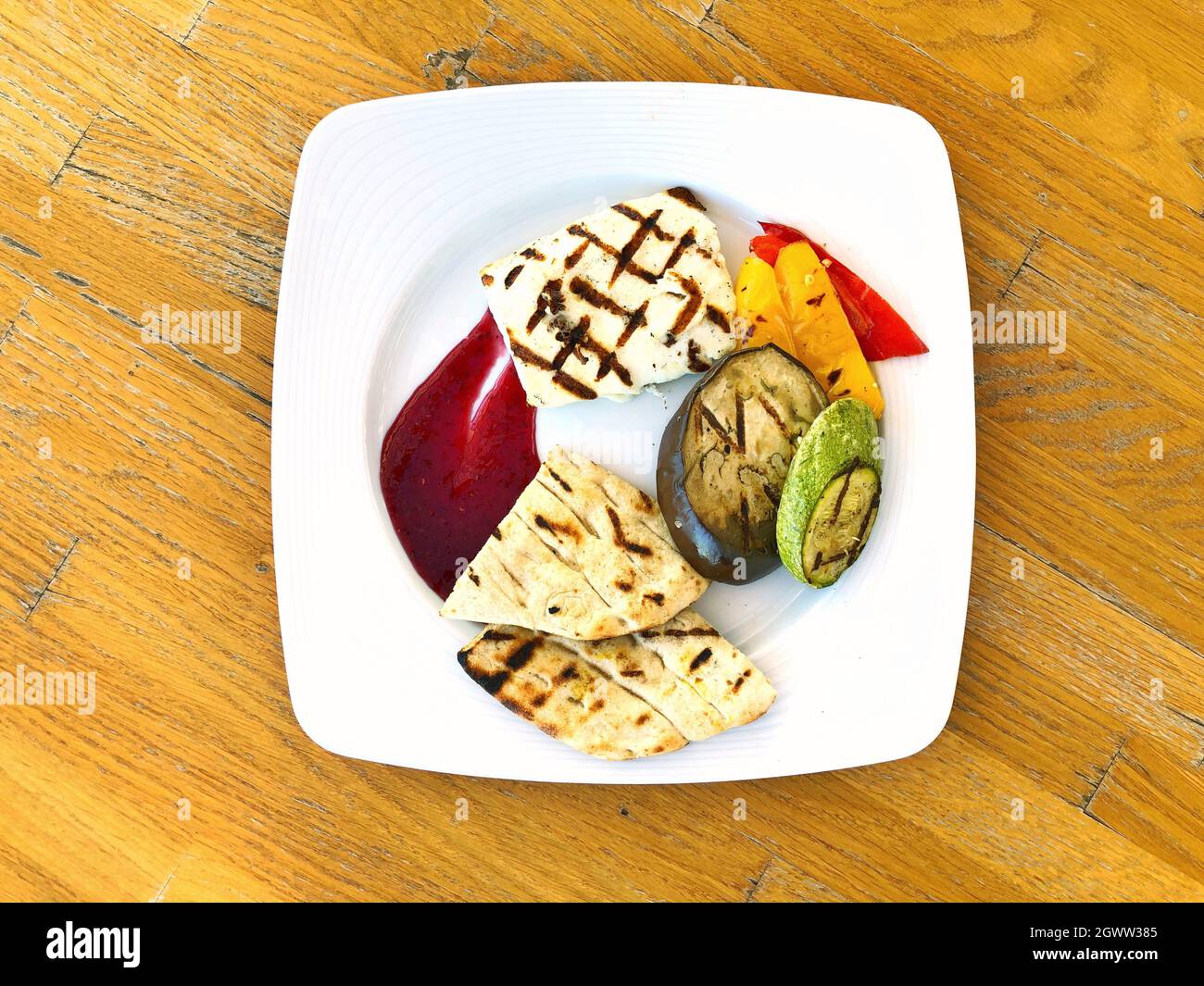 Grilled Talagani Cheese With Pita Bread And Grilled Vegetables Stock Photo  - Alamy