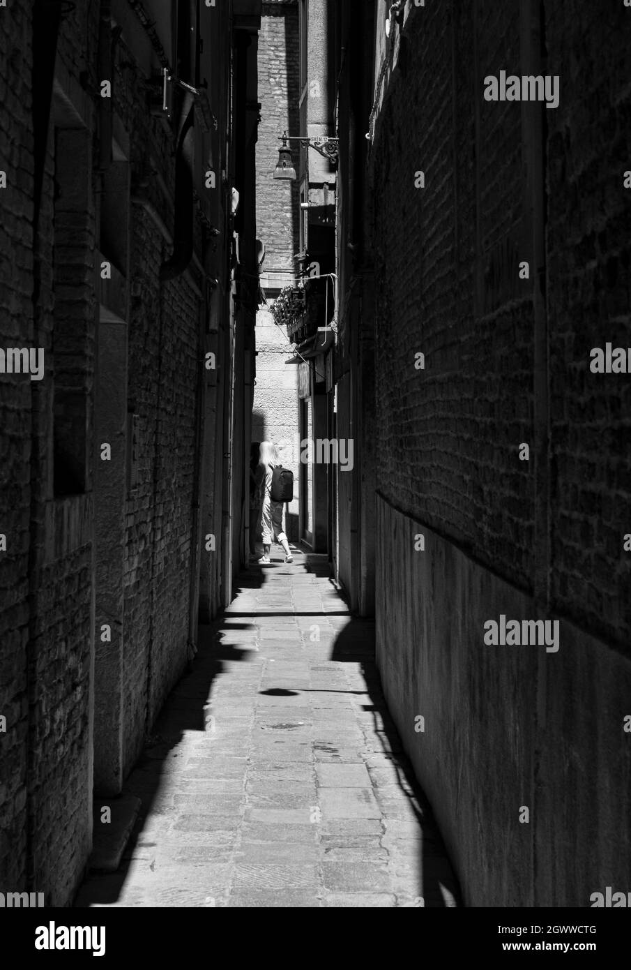 Narrow lane with street lamp Black and White Stock Photos & Images Alamy