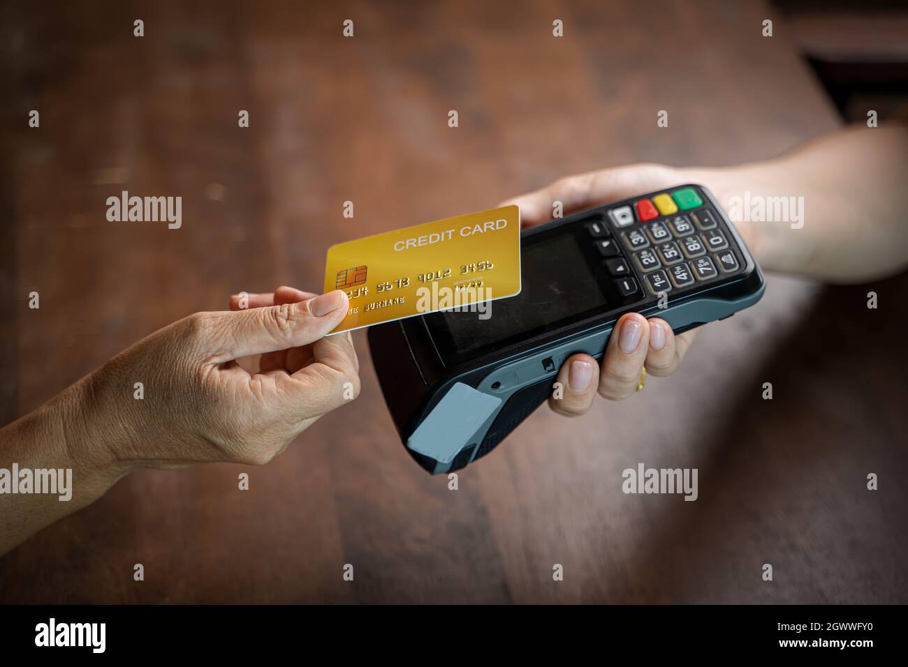 Customer Using Credit Card For Payment To Owner At Cafe,payment Transaction With Card. Stock Photo