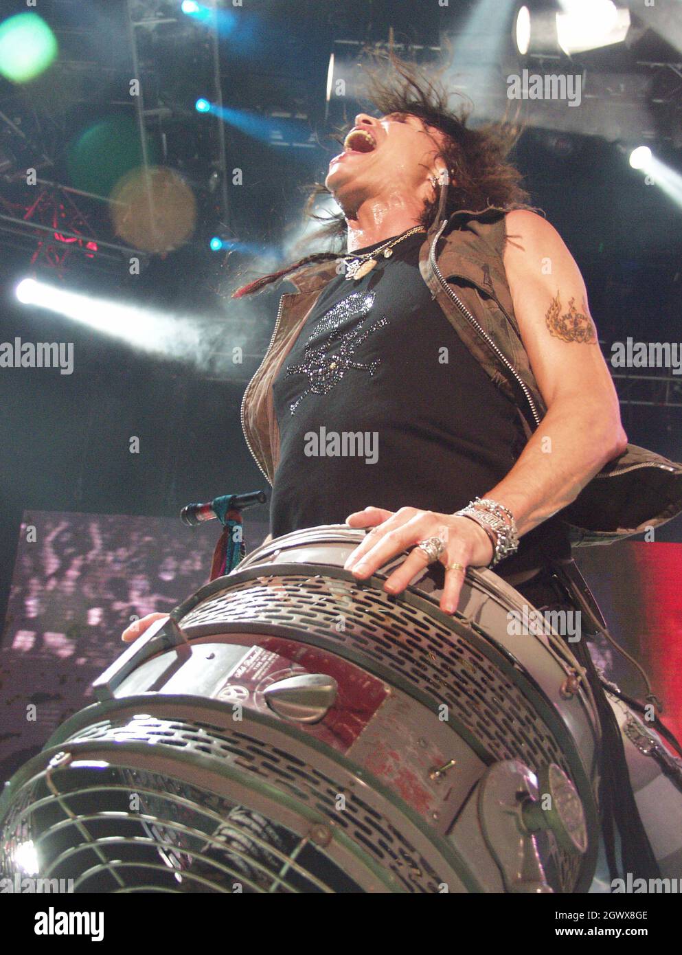 Aerosmith lead singer Steven Tyler sings 'God Bless America' during the  seventh inning stretch of the Red Sox home opener against the Detroit  Tigers at Fenway Park in Boston, Massachusetts on April