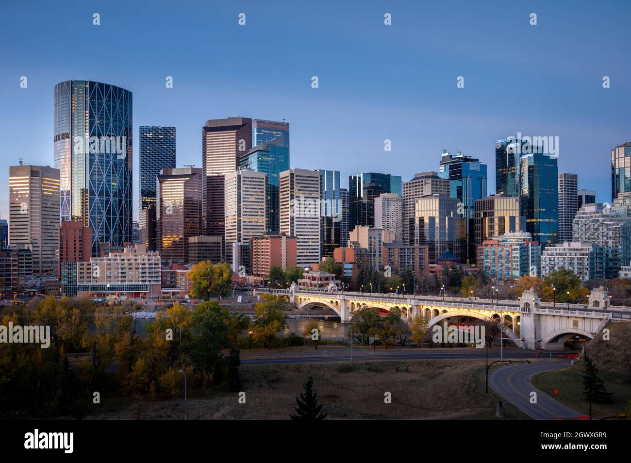 View of Calgarys beautiful skyline along the Bow River at sunrise Stock ...