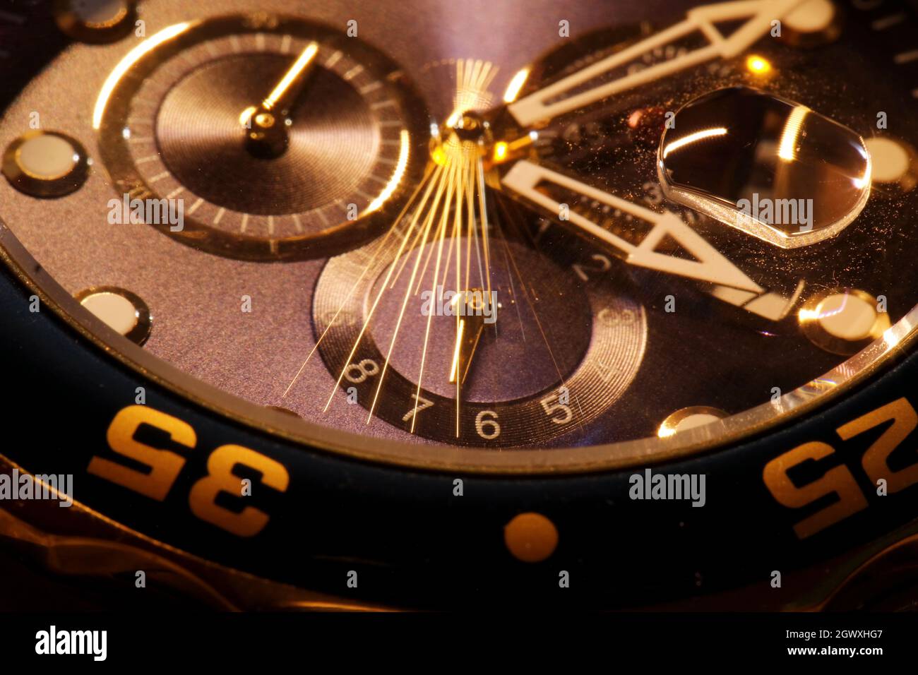 Macro analog watch second hand across face Stock Photo