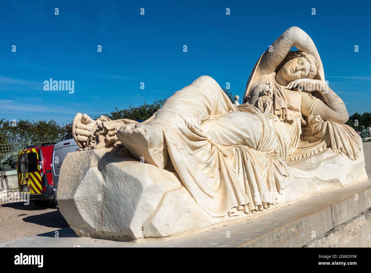 Reclining Female Statue in the Gardens of Versailles Stock Photo