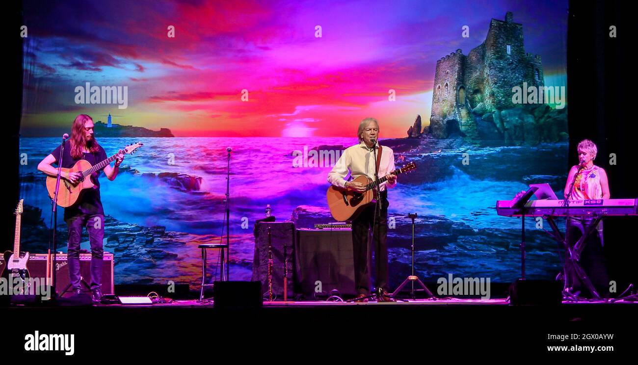 (L-R) Mike Dawes, Justin Hayward and Julie Ragins perform in concert at the Paramount on October 2, 2021 in Huntington, New York. Stock Photo
