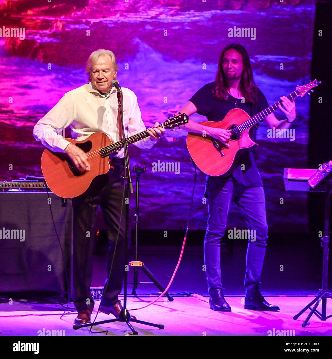 Justin Hayward (L) and Mike Dawes perform in concert at the Paramount on October 2, 2021 in Huntington, New York. Stock Photo
