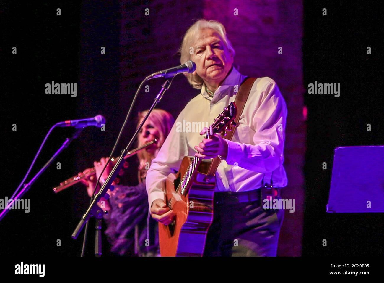 Justin Hayward (R) and Karmen Gould perform in concert at the Paramount on October 2, 2021 in Huntington, New York. Stock Photo