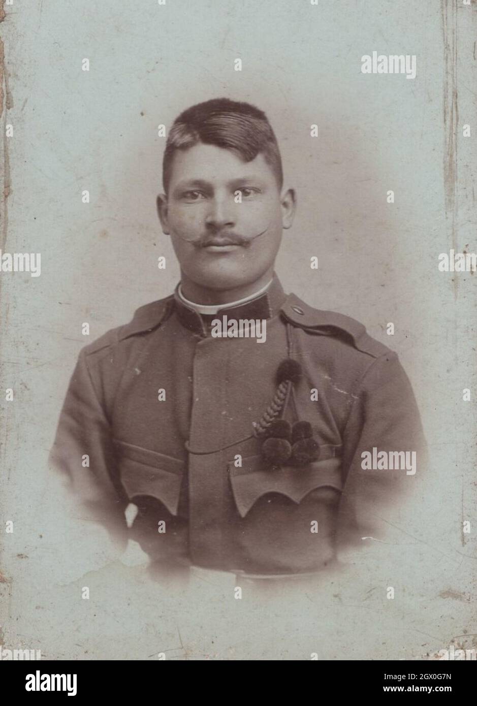 original antique CDV carte de visite series 10. young Austrian ( Vienna ) soldier (army officer) in uniform with an extremly wierd strange hair style and moustache from the 1890's. source: original photograph Stock Photo