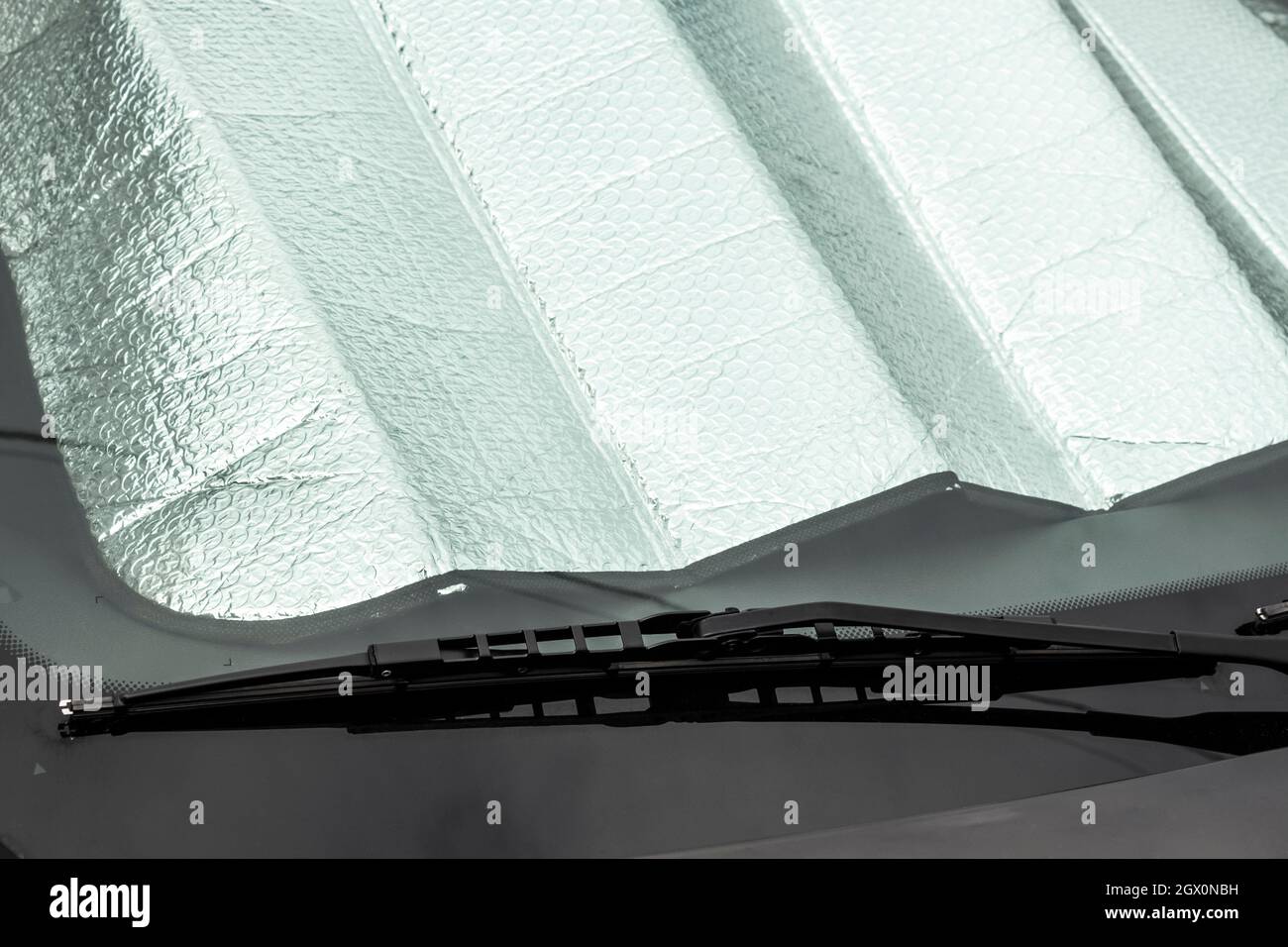 Heat reflective screen behind the windshield of the car stock photo alamy