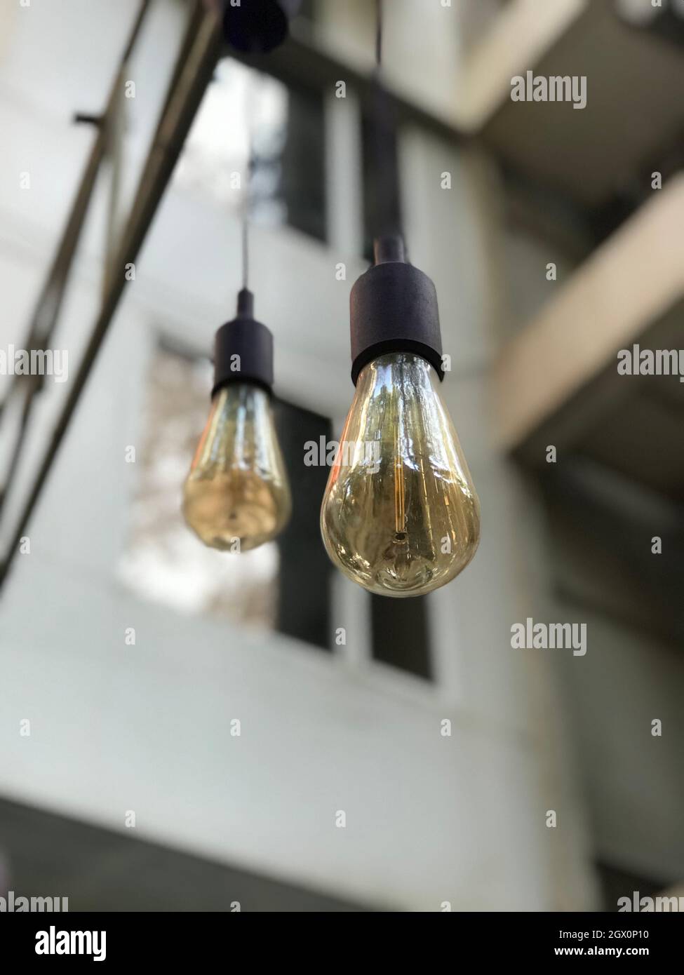Low Angle View Of Illuminated Light Bulb Stock Photo - Alamy