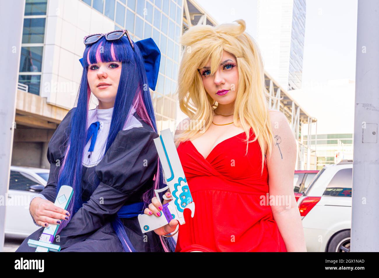 Attendee portraying Panty and Stocking in uniforms outfits, at Comic Con in Los Angeles, CA, United States Stock Photo