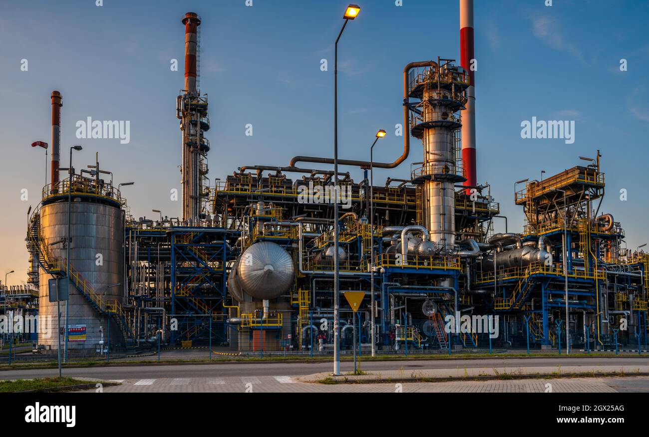 Oil refinery in the light of the setting sun Stock Photo - Alamy