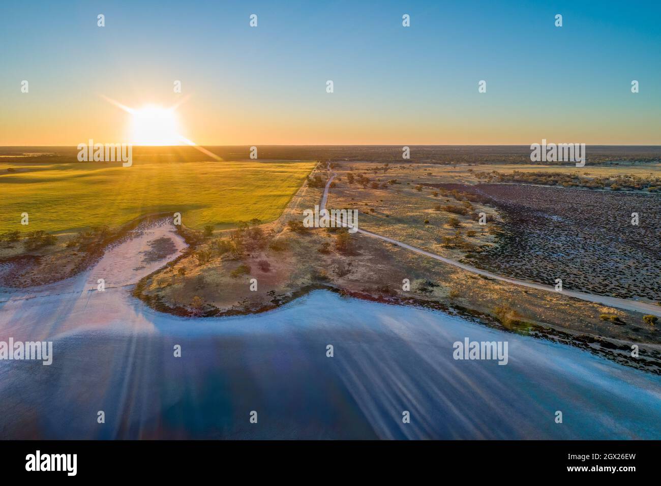 Aerial View Of Landscape Against Sky During Sunset Stock Photo