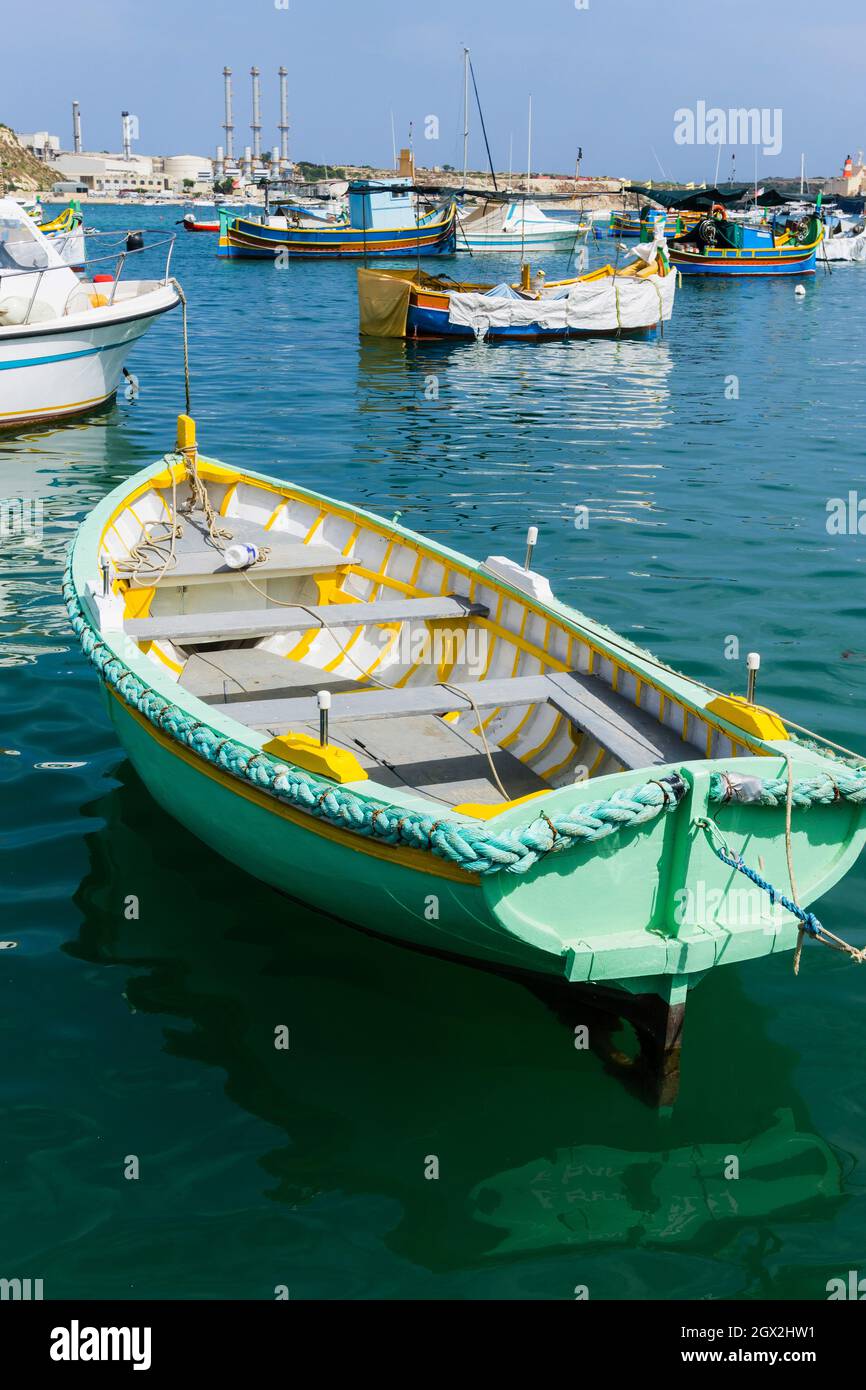 Boats Moored In Sea Against Sky Stock Photo