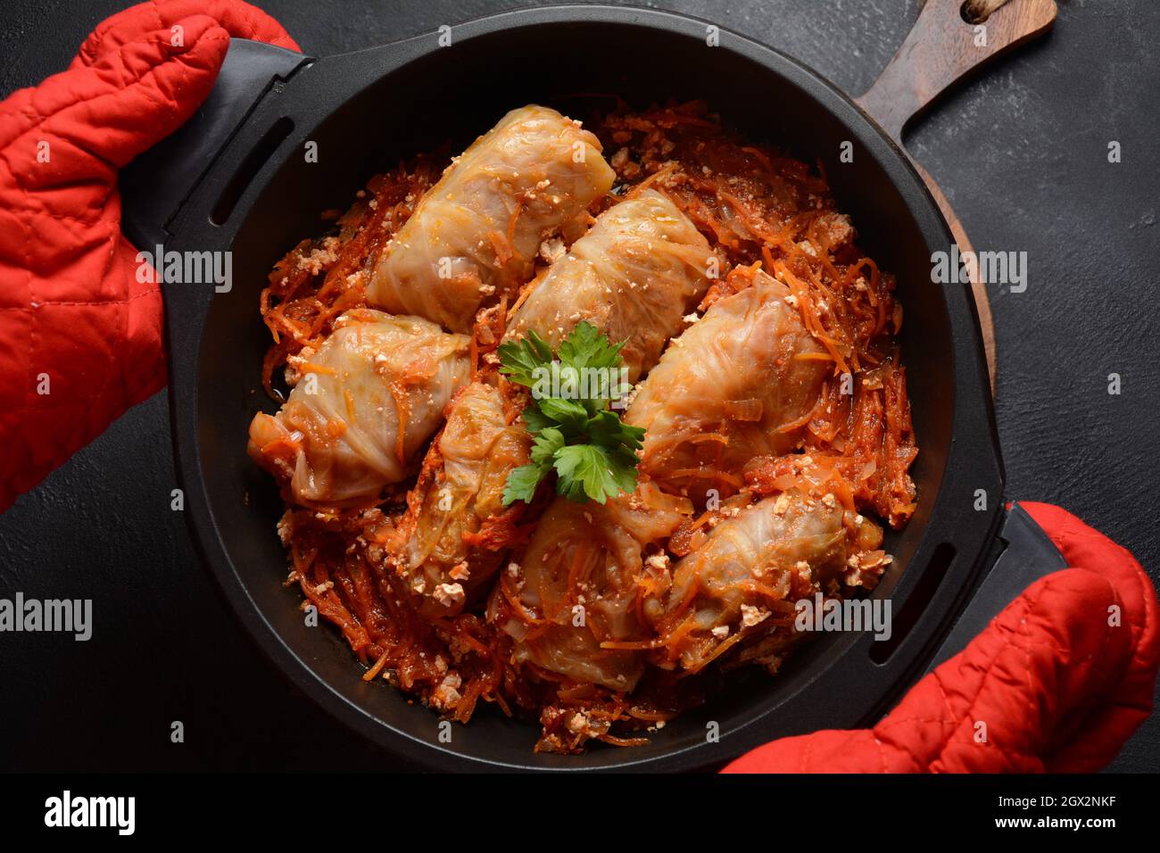 Cabbage rolls stuffed with ground beef and rice in tomato sauce Stock