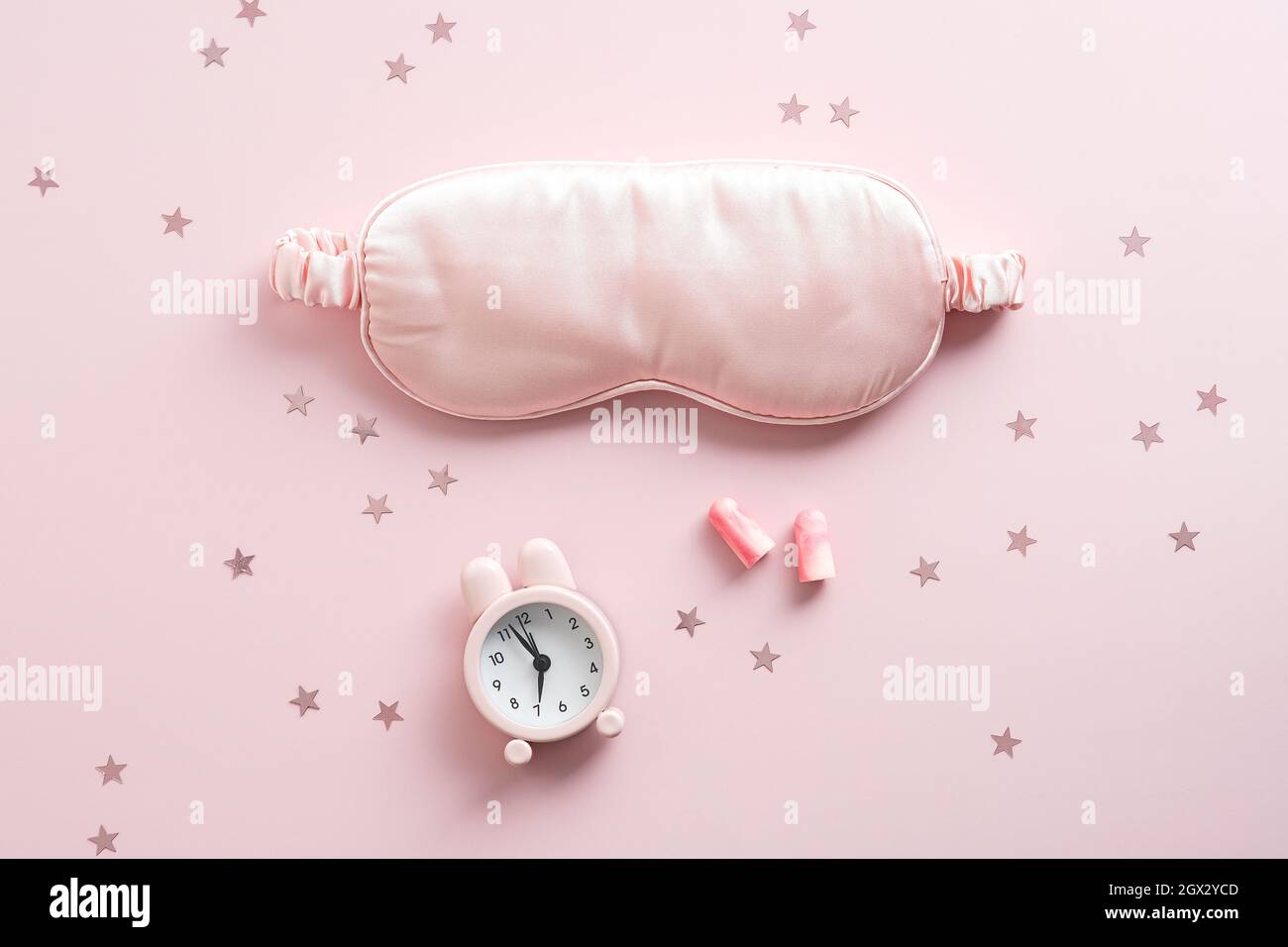 Flat lay sleeping mask, alarm clock, earplugs on pink background ... - Insomnia Relief With Earplugs