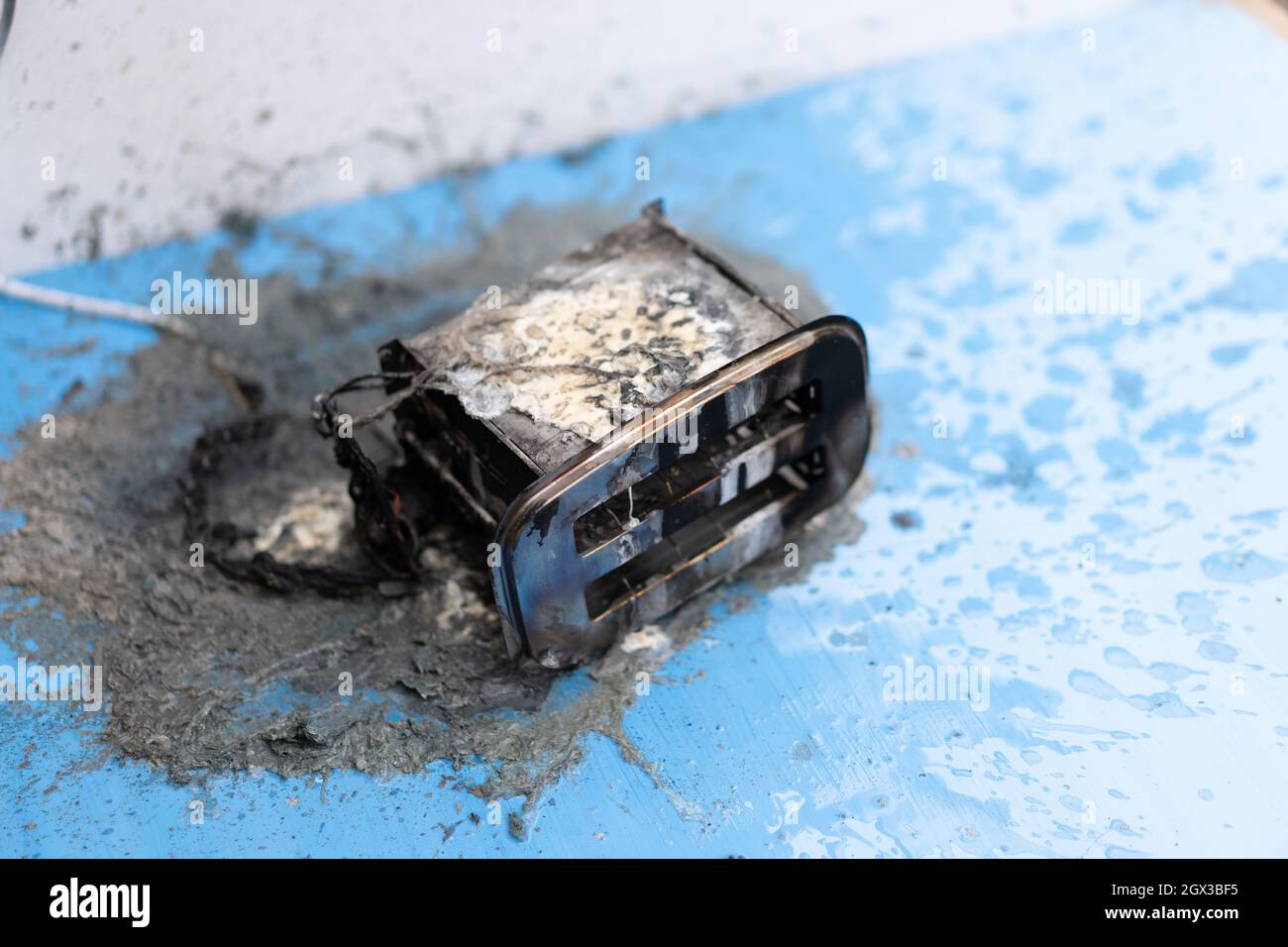 Toaster after fire. Household electrical appliance fire hazard