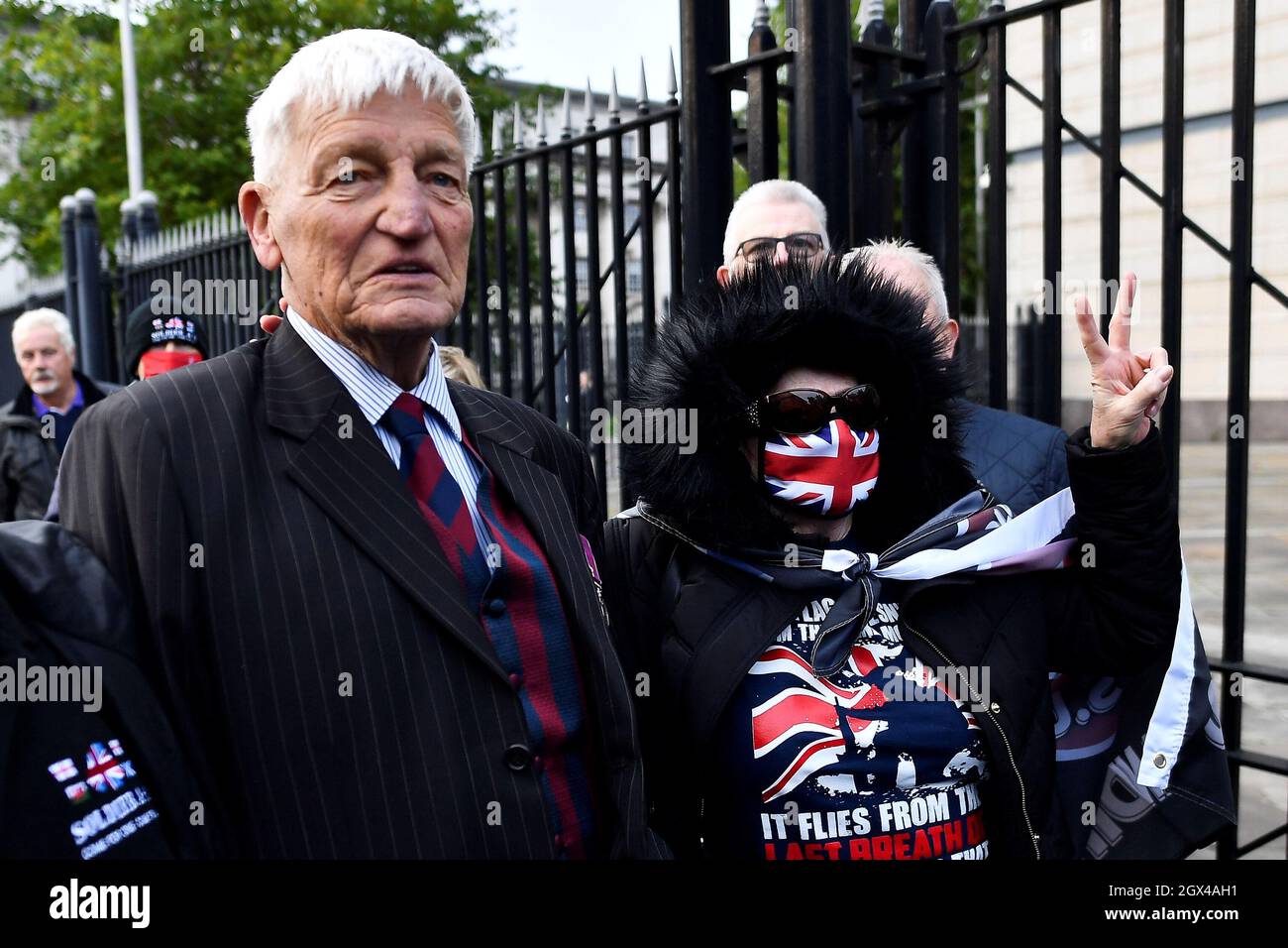 British Army veteran Dennis Hutchings poses with a supporter outside Laganside Courts as he arrives for his hearing for the 1974 Northern Ireland Troubles related death of John Pat Cunningham, in Belfast, Northern Ireland, October 4, 2021. REUTERS/Clodagh Kilcoyne Stock Photo