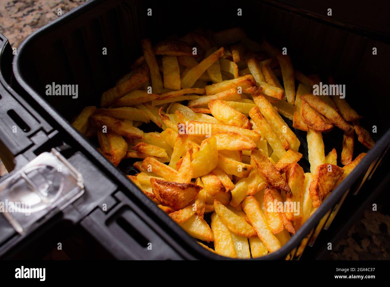 Air Fryer homemade grilled potatoes Stock Photo Alamy