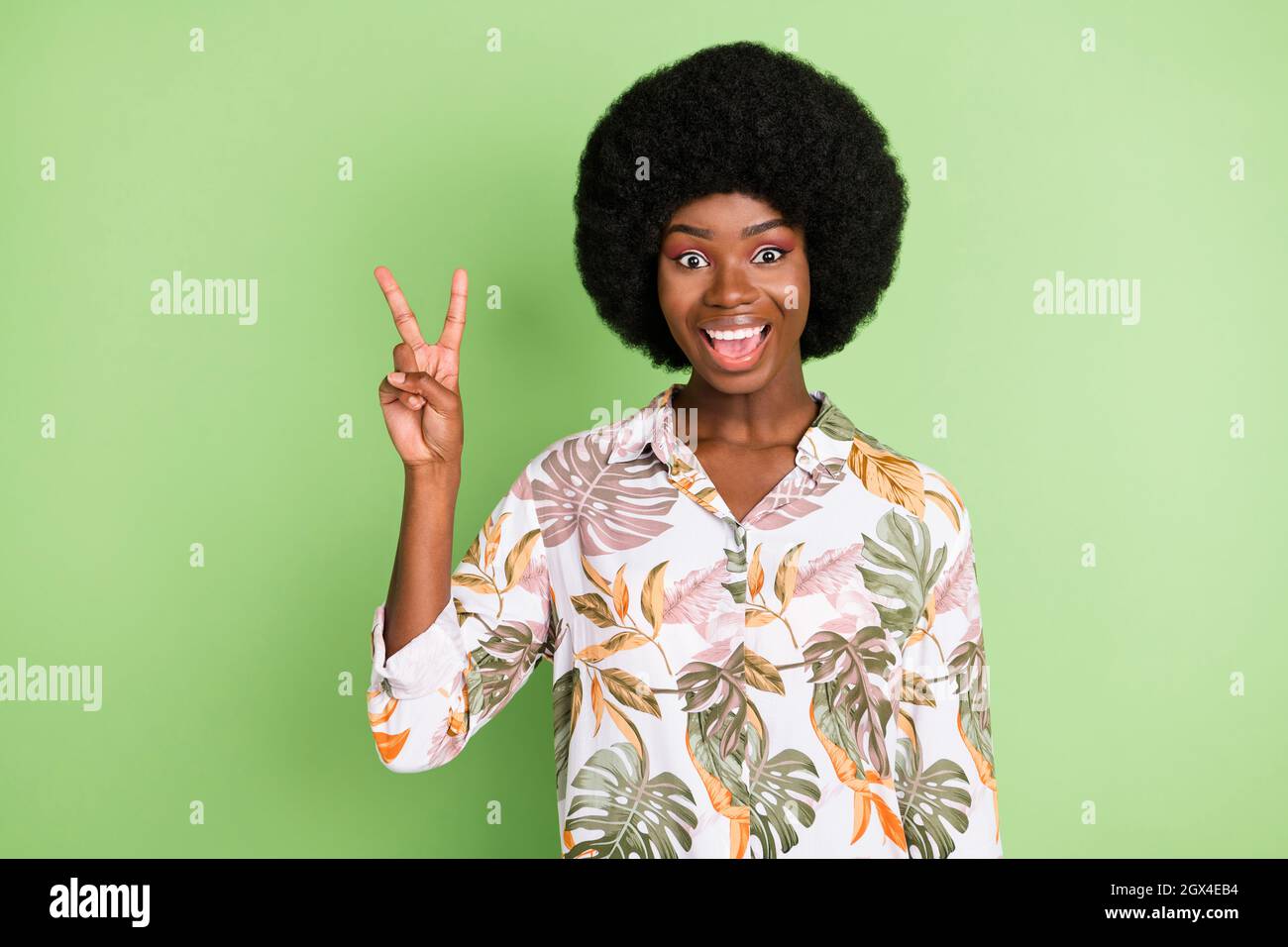 Photo of young cheerful afro girl happy positive smile show peace cool ...