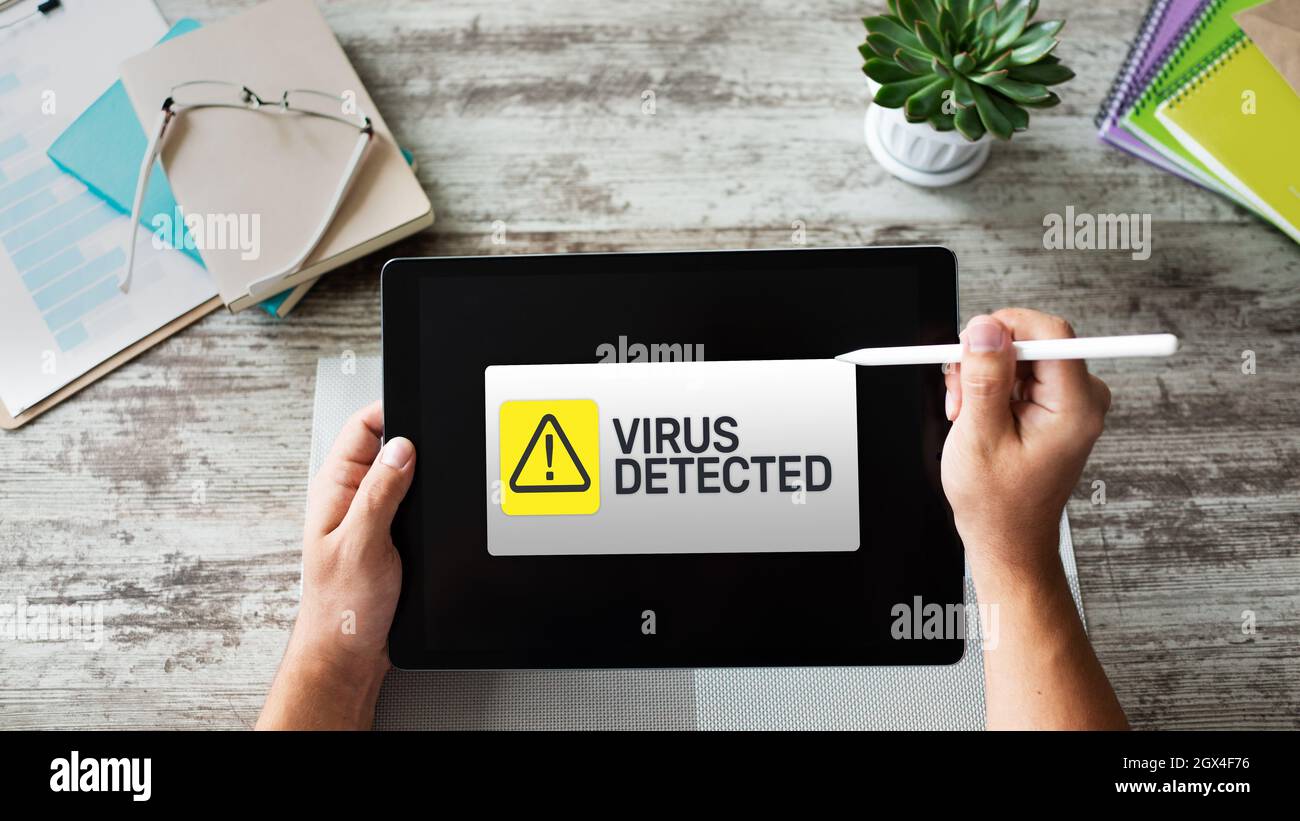 Virus Detected warning message on screen. Cyber security breach. Data protection internet and technology concept. Stock Photo