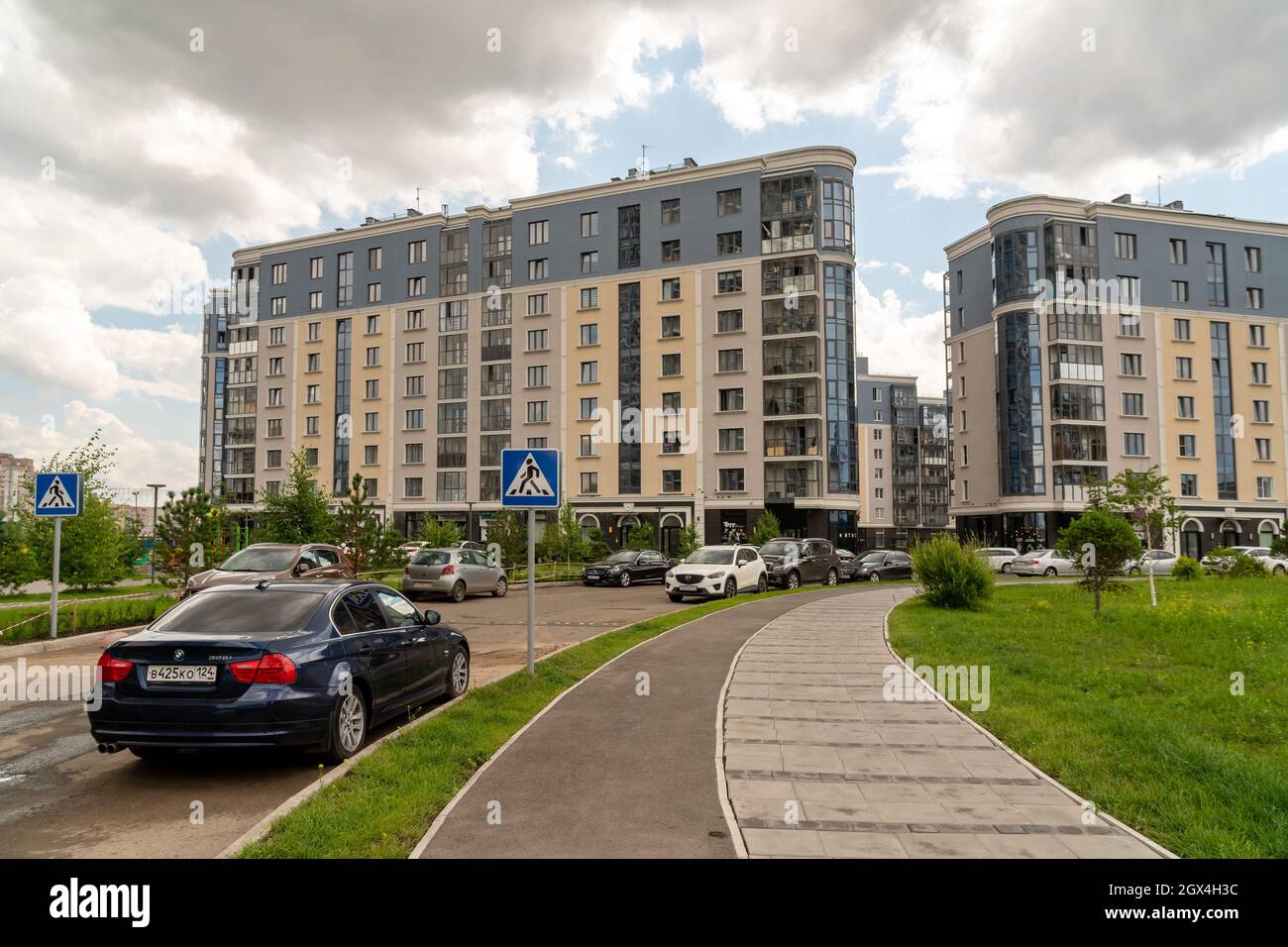 Multi-storey buildings in the new residential complex Preobrazhensky on a cloudy summer day. Stock Photo