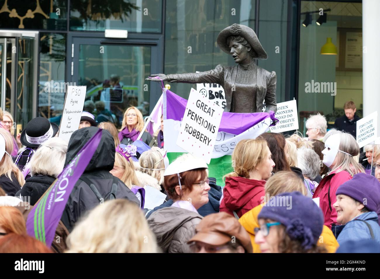 Manchester, UK – Monday 4th October 2021 – Women Against State Pension Injustice - WASPI women  protest outside the Conservative Party Conference in central Manchester against the rise in womens pension age. Photo Steven May / Alamy Live News Stock Photo