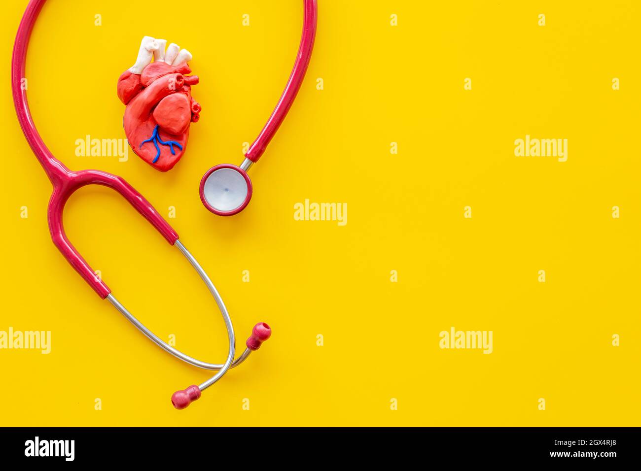 Human heart model with stethoscope top view. Health insurance and heart ...