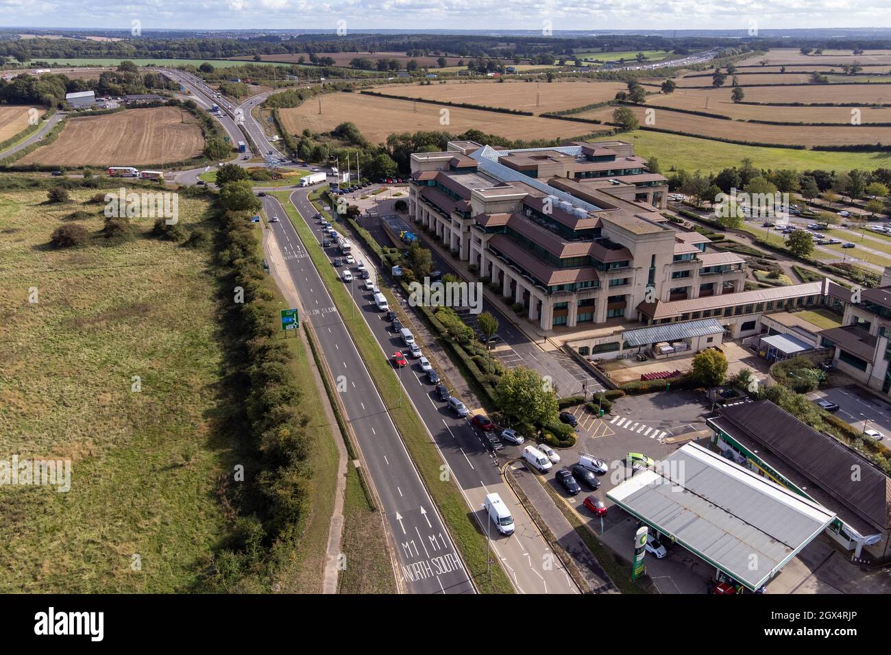 People queue for fuel at a petrol station in Hemel Hempstead. Picture
