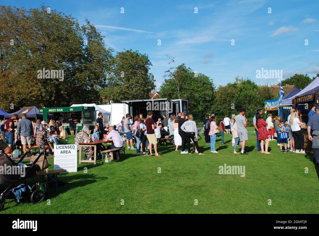 People queue at a food stall during the annual Food and Drink Festival at Tenterden in Kent, England on September 11, 2021. The event was first held in 2017. Stock Photo